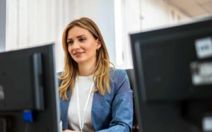 businesswoman in modern office working on computer